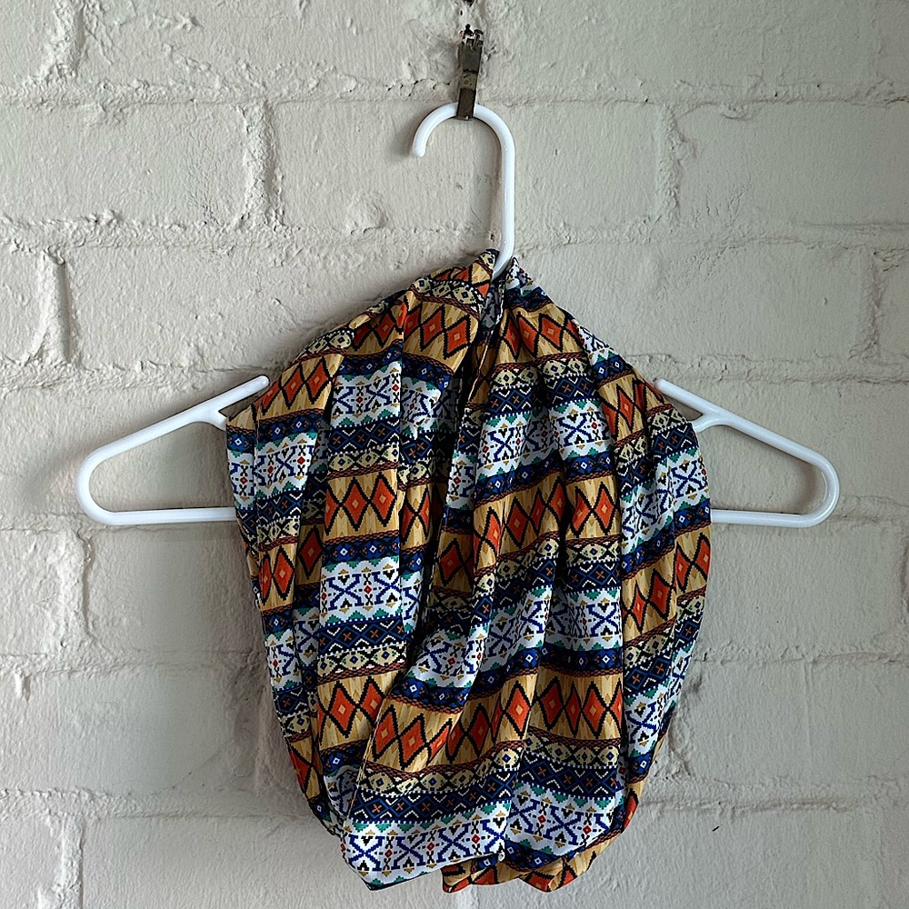 Charming Charlie white blue and orange tribal multi colored boho infinity scarf